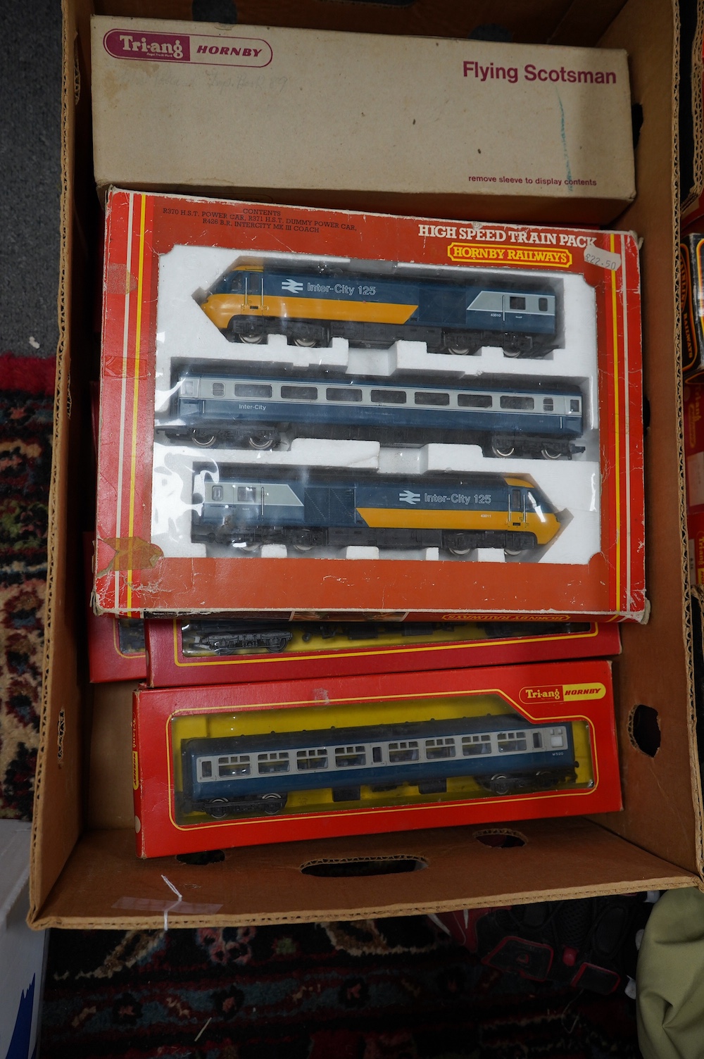 A collection of boxed 00 gauge railway by Hornby Railways, Tri-ang Hornby, etc. including an InterCity 125 HST 3-car set (R332), a Class A3 Flying Scotsman locomotive (R850), together with twenty-four InterCity, Southern